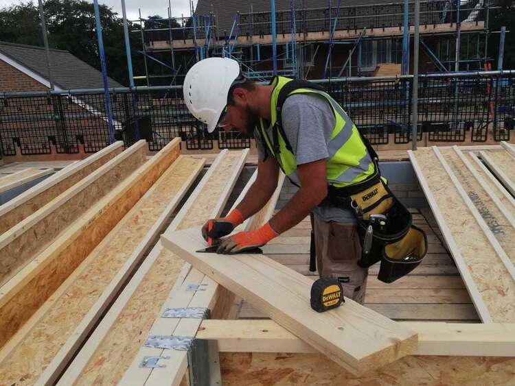 Apprentice doing carpentry work